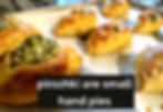 Golden pirozhki on a baking sheet with a filling, text overlay reads "pirozhki are small hand pies." Warm kitchen setting.