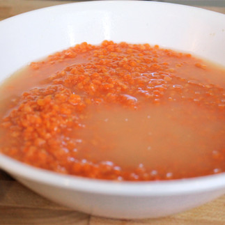 soaking lentil in a white bowl