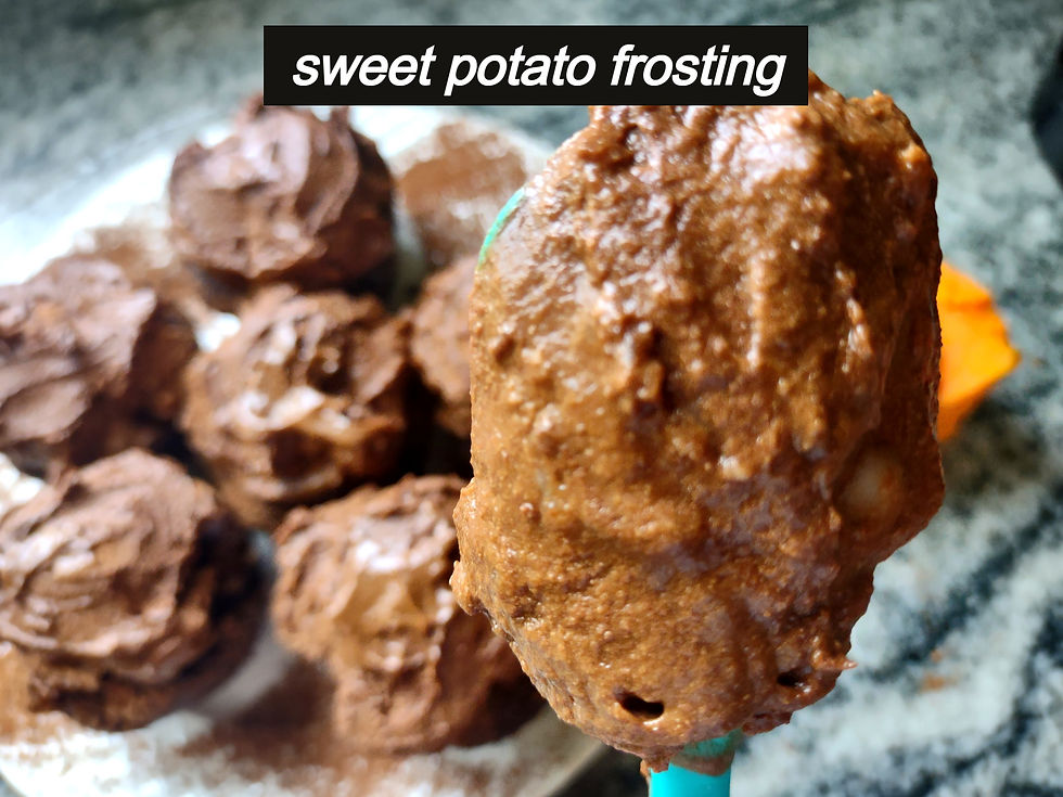 cupcakes and frosting on a spoon