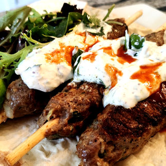 kebabs are ready to serve with Tzatziki Sauce