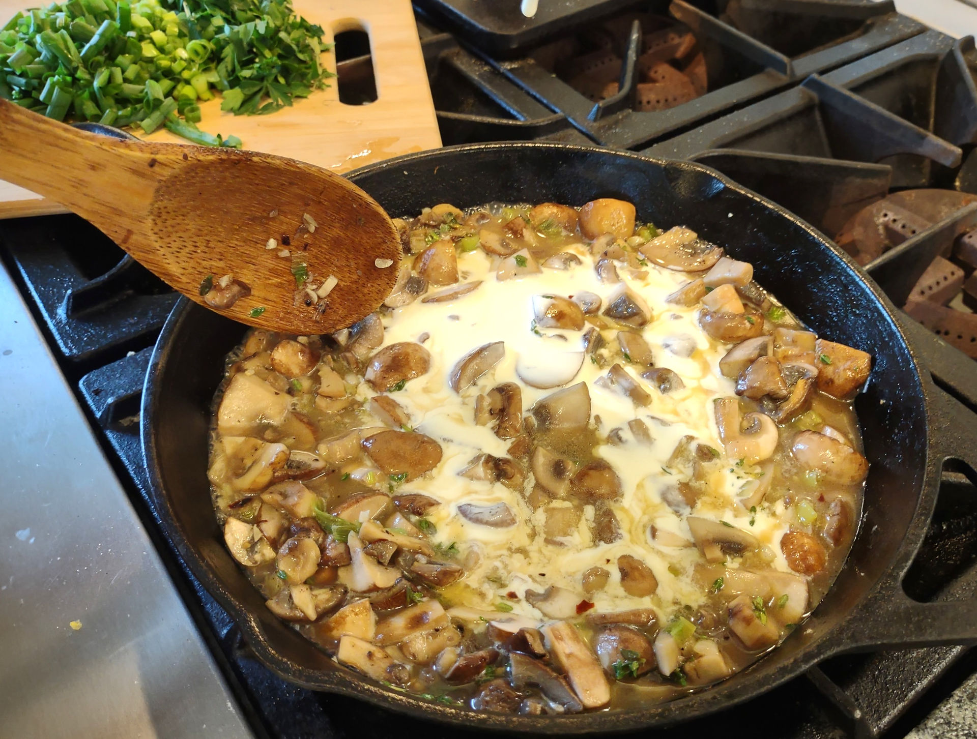 mushrooms and cream on a cast iron pan