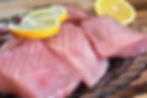 fillets of mahi mahi with slices of lemon