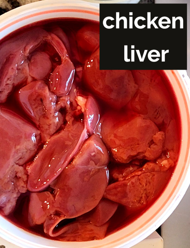 Chicken liver in a white container with a rich red color. The text "chicken liver" is displayed in bold on a black background.
