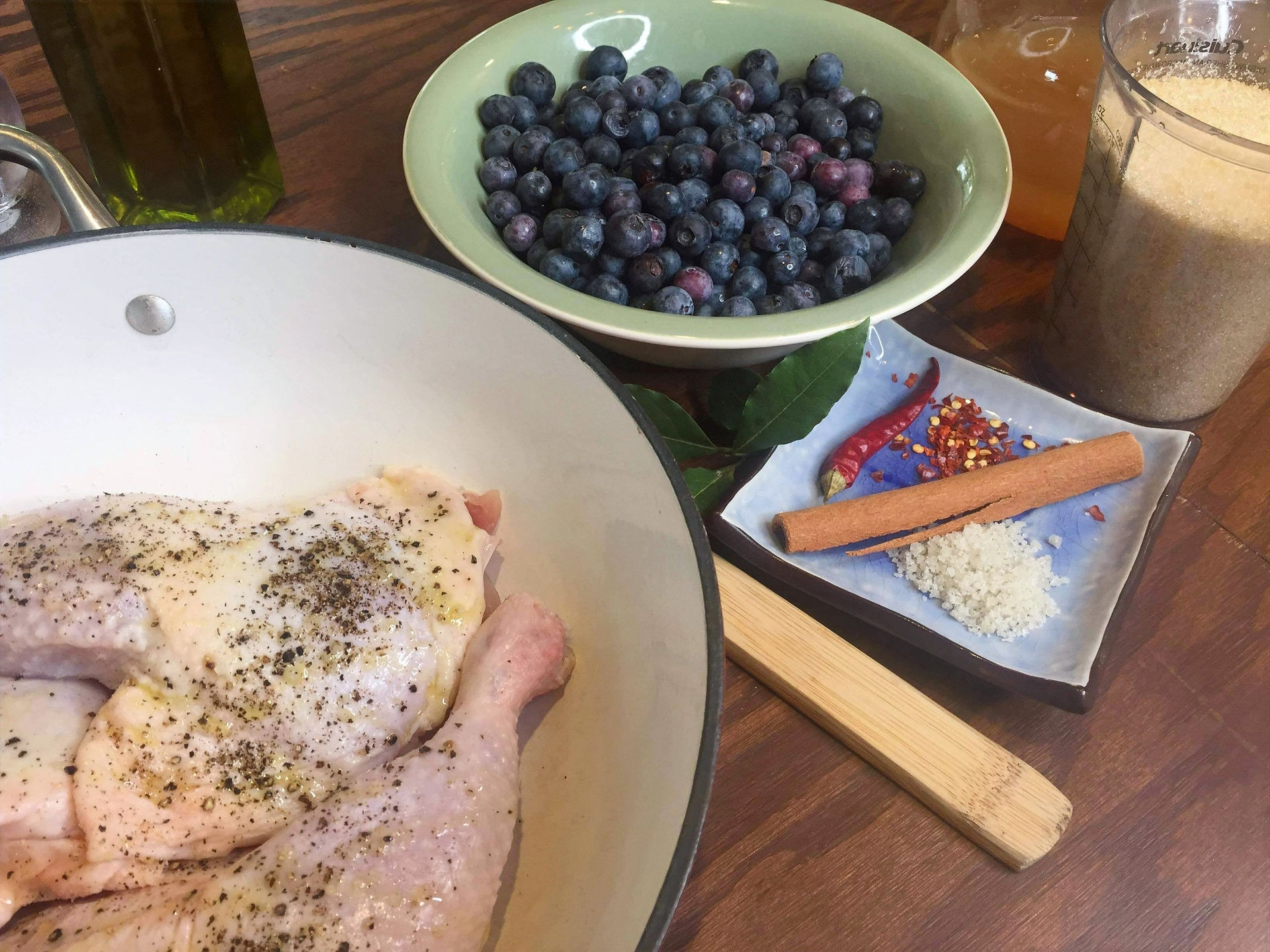 Ingredients to make blueberry barbecue sauce and chicken