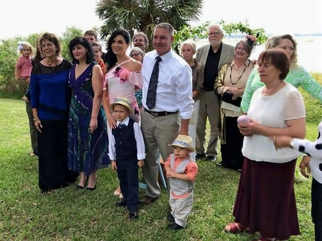 Group of people posing to celebrate a wedding anniversary