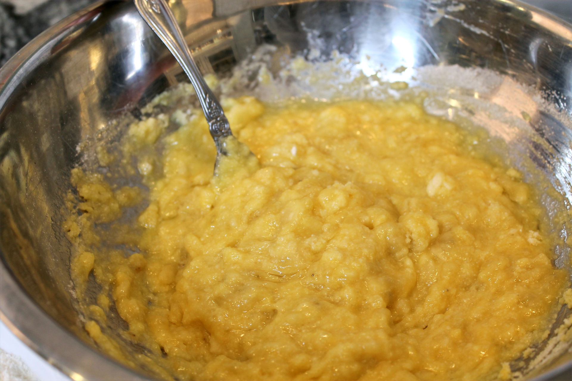 banana pancakes batter in a metal bowl