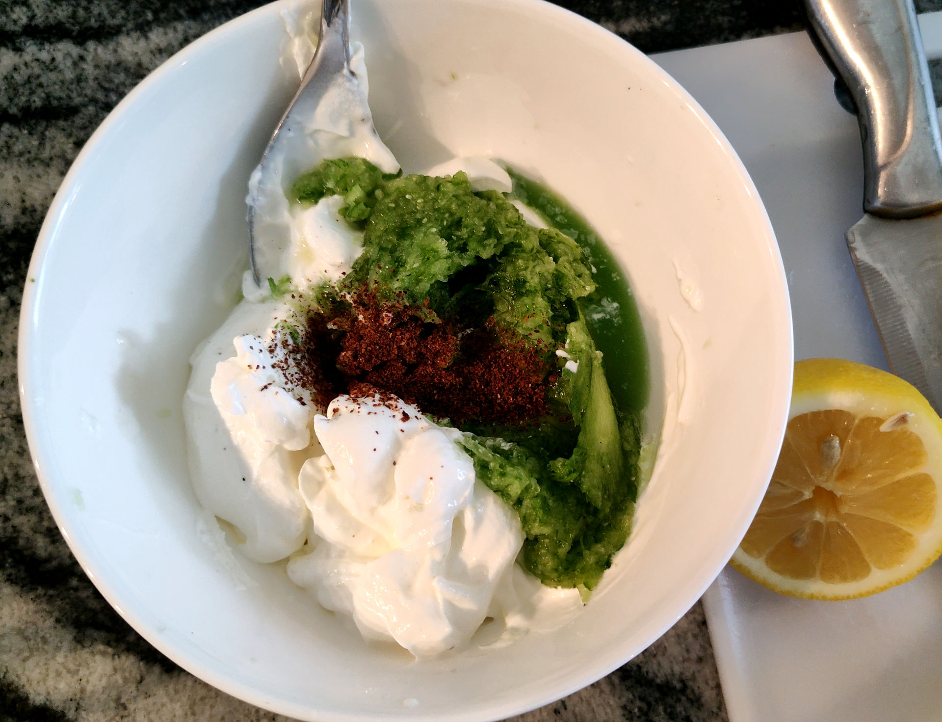 spices, yogurt and grated cucumber