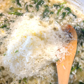 parmesan added to risotto.