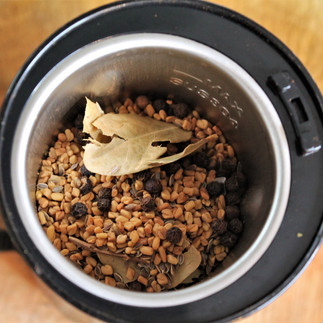 spices in an electric grinder