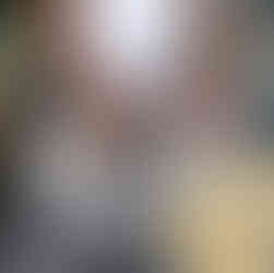 Inna rolling pelmeni dough into a sausage shape