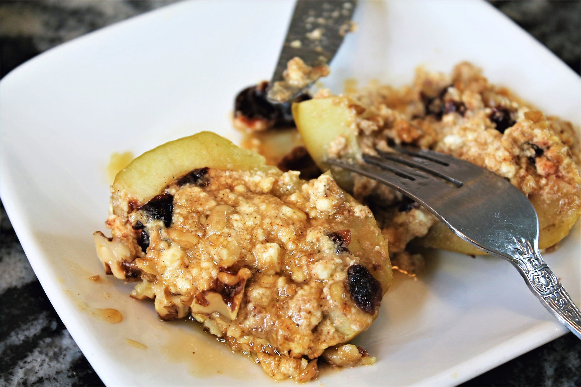 baked stuffed apple on a plate