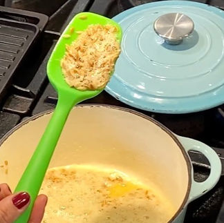 fried orzo on a spoon