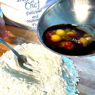 adding wet ingredients into dry