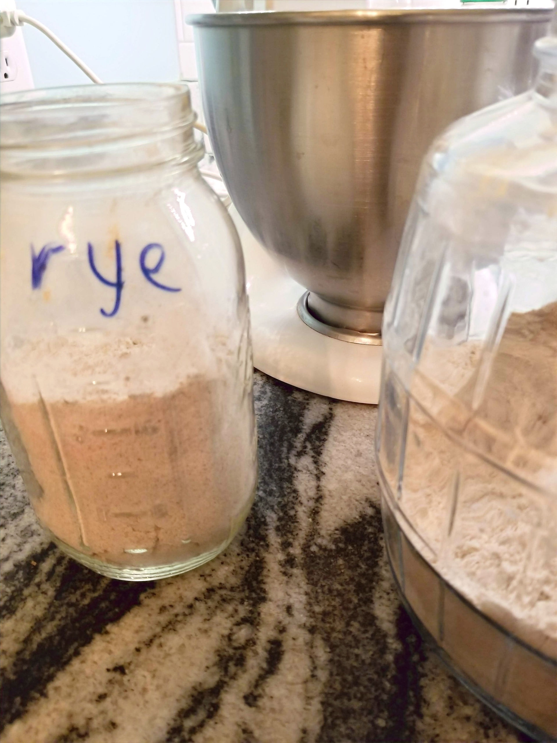 Glass jar full of rye flour