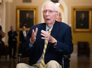 Mitch McConnell Reaching Across Aisle For Uppies