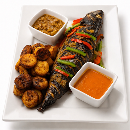 Whole grilled Mackerel seasoned with aromatic spices and served with sweet plantains, savory sautéed onions sauce, and our signature pepper sauce.