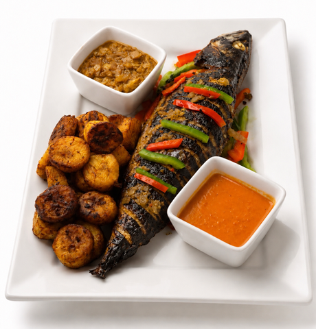 Whole grilled Mackerel seasoned with aromatic spices and served with sweet plantains, savory sautéed onions sauce, and our signature pepper sauce. 