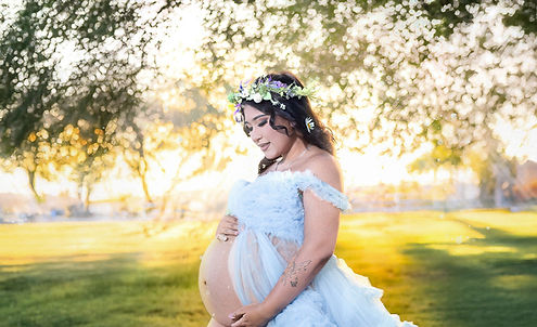 Maternity photography session at Floyd Lamb Park in Las Vegas by H&K Photography & Film, capturing expecting parents in a beautiful natural setting with lush greenery, scenic paths, and tranquil lake views. Professional photography includes intimate portraits, candid interactions, and creative compositions that highlight the love, joy, and anticipation of welcoming a new family member. Celebrate life’s most precious moments with H&K in Las Vegas, from maternity sessions to newborn portraits, capturing the beauty and emotion of growing families. Browse our portfolio featuring stunning locations like Calico Basin, Floyd Lamb Park, and Craig Ranch Park, where every session tells a unique story and preserves timeless memories in a luxurious, artistic style.