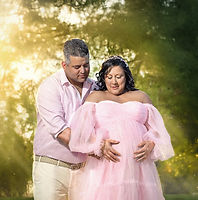 Maternity session at Floyd Lamb Park with expecting couple and mom of a baby girl — tender moments in nature at golden hour, Las Vegas.