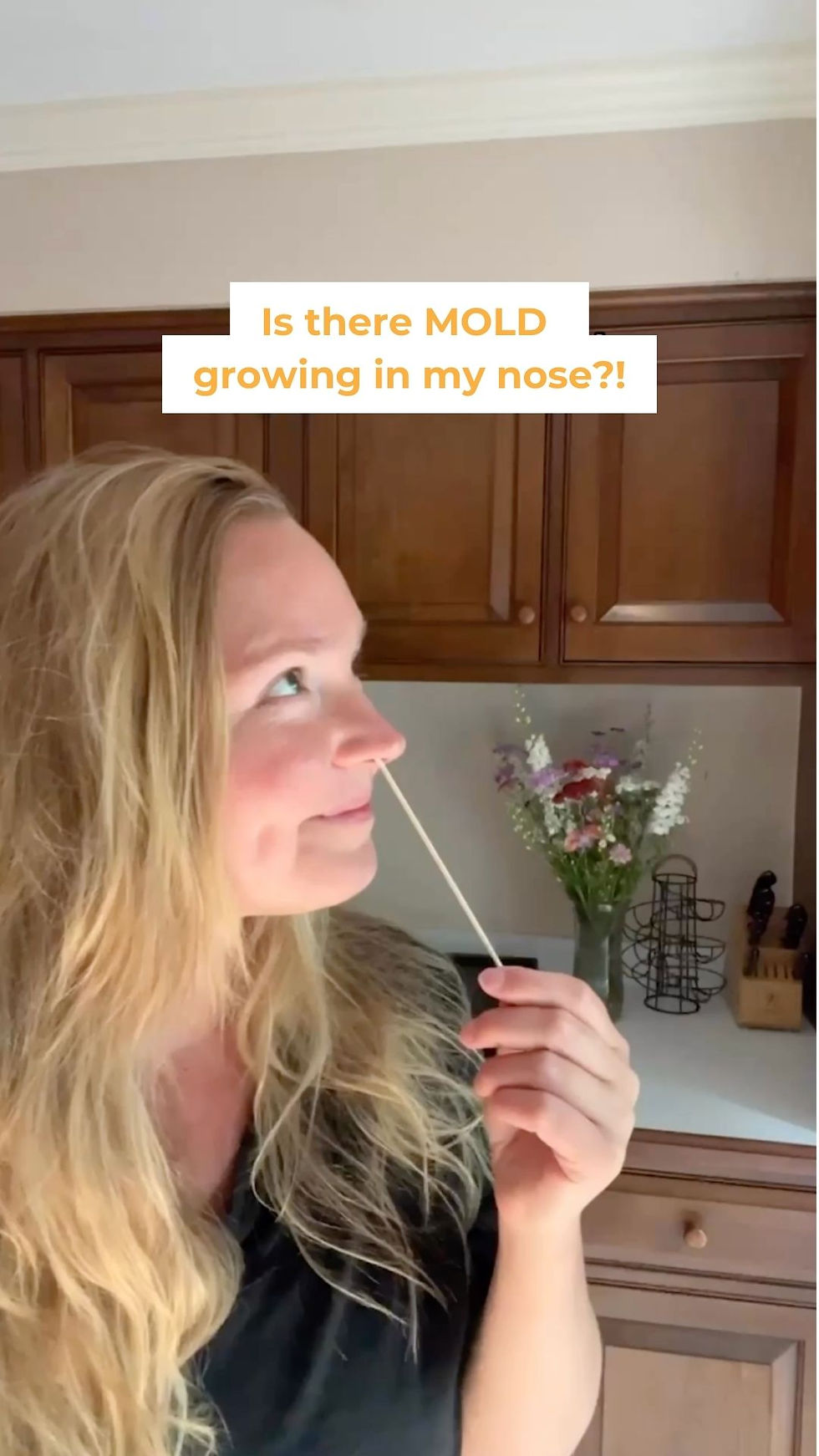 pic swabbing my nose (gently)