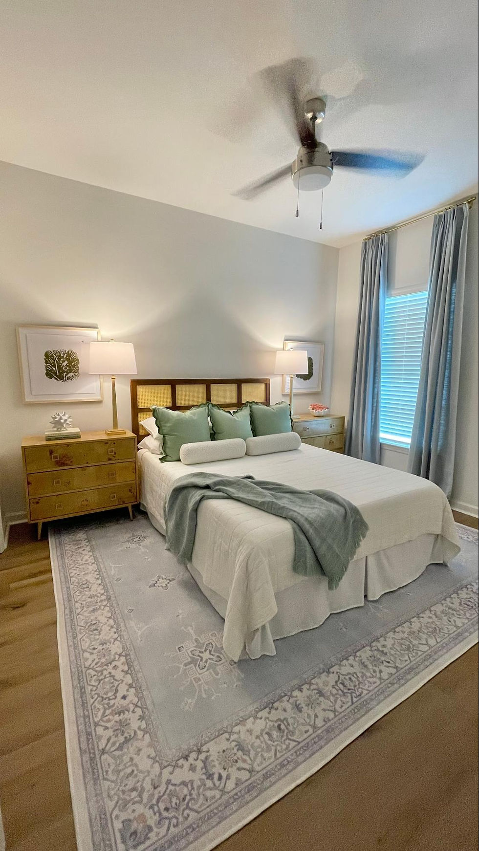 The primary bedroom of the Cypress Point Model Home | Interior Design: Rylee Martin, Senior Designer for Rachel Cannon Limited Interiors