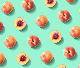 Colorful fruit pattern of fresh peaches 