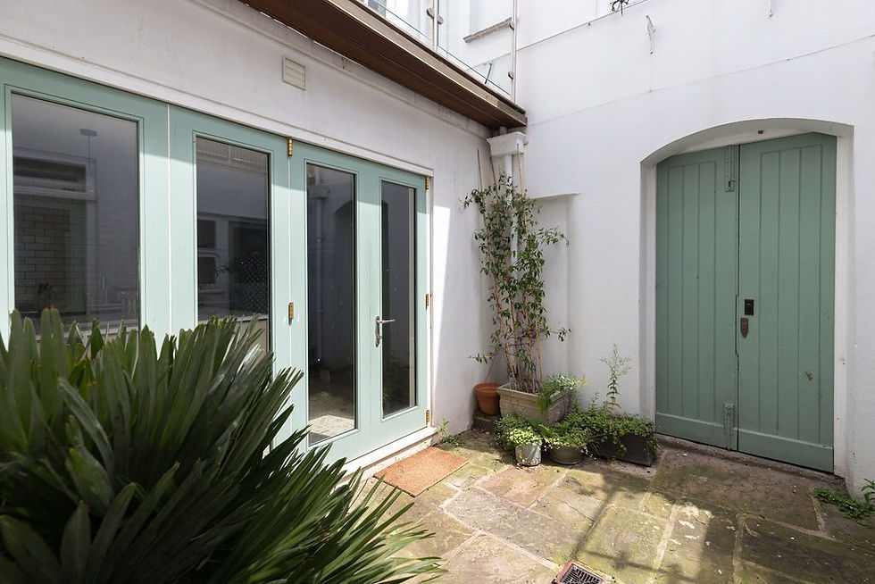 Pastel Green courtyard by Absolute Project Management