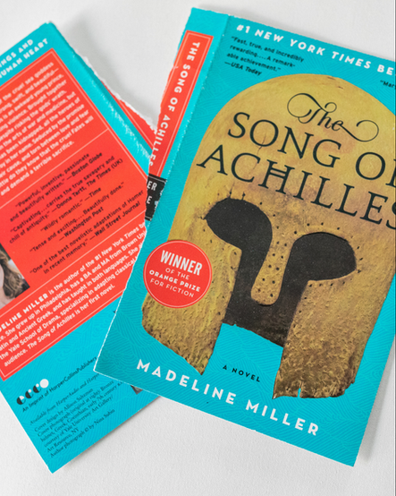 The torn off cover of the book The Song of Achilles by Madeline Miller