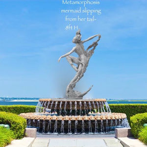 'Metamorphosis' by Franco Castelluccio — mermaid ascending and shedding her tail in transformation.