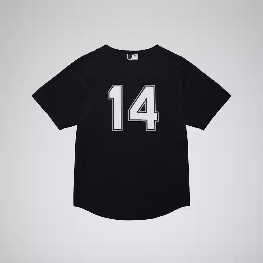 A Black white sox jersey on its backside displaying the numbers "14" for Paul Konerko in white with a black and grey trim. On the neckline there is an MLB logo in the same color scheme 