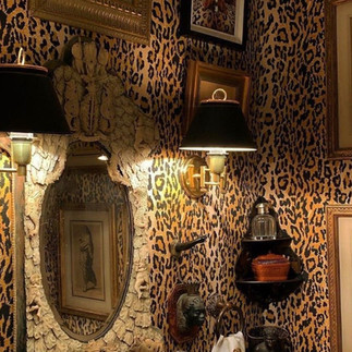 Wallpaper can be one of the most bold ways to enhance a space using animal print.