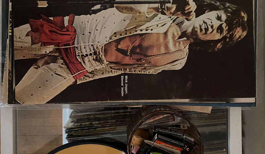 Vintage LIFE magazine with Mick Jagger on the cover and a jar full of vintage matchbooks