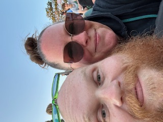 Man and wife at stock car races.