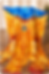 Blue and orange tie-dye fabric draped on a stand.