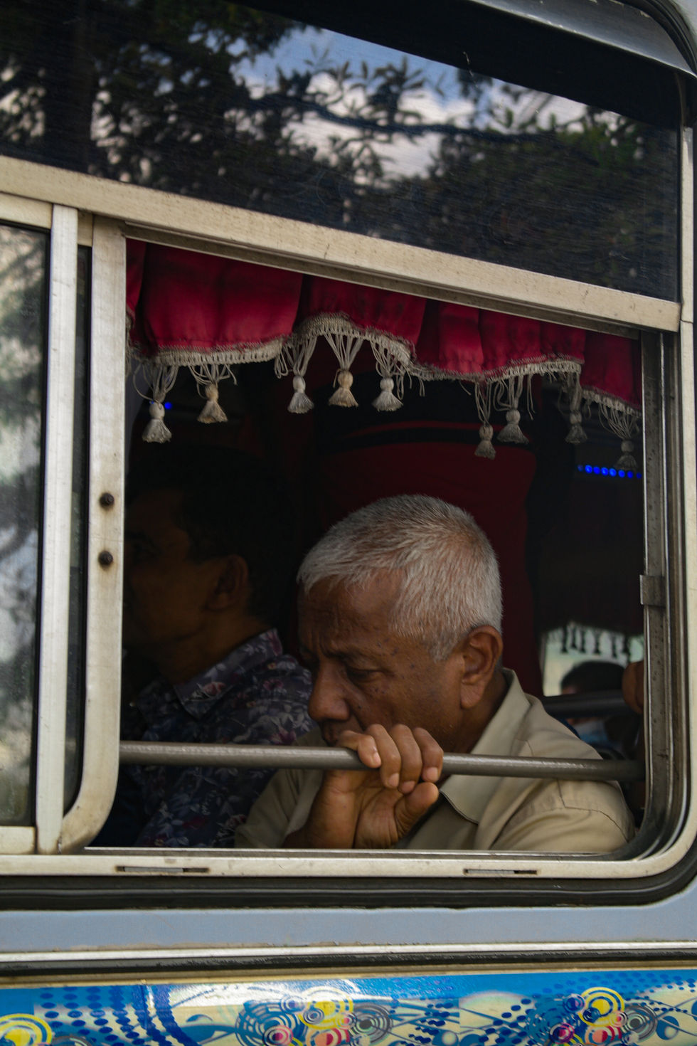man sleeping on the bus