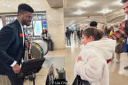 Dr. Edward W. Hardy with young fan at his Subway Series, Grand Central Terminal, March 15, 2026.