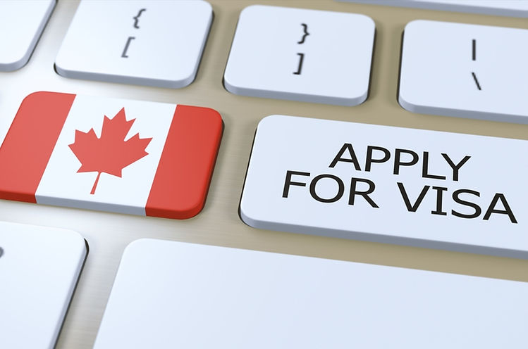 Apply for a visa in Canada with a Canadian flag and the words Apply for visa on a keyboard