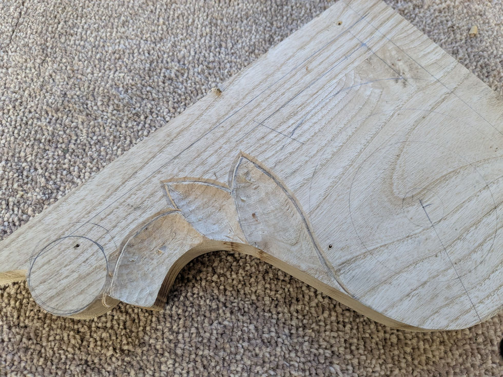 Carved foliage on wooden bracket