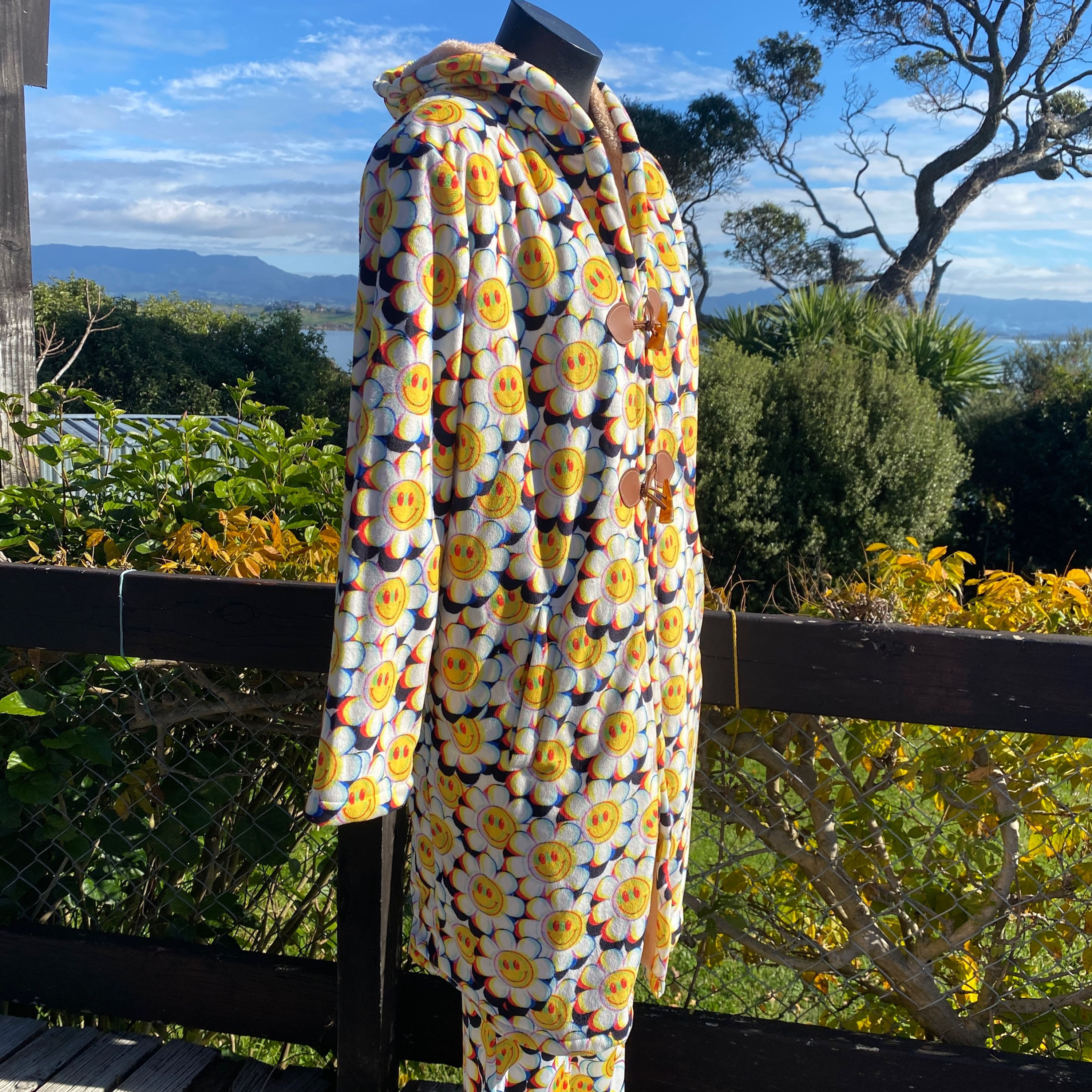 Crazy Daisy rave coat, side view on mannequin showing cosy relaxed fit