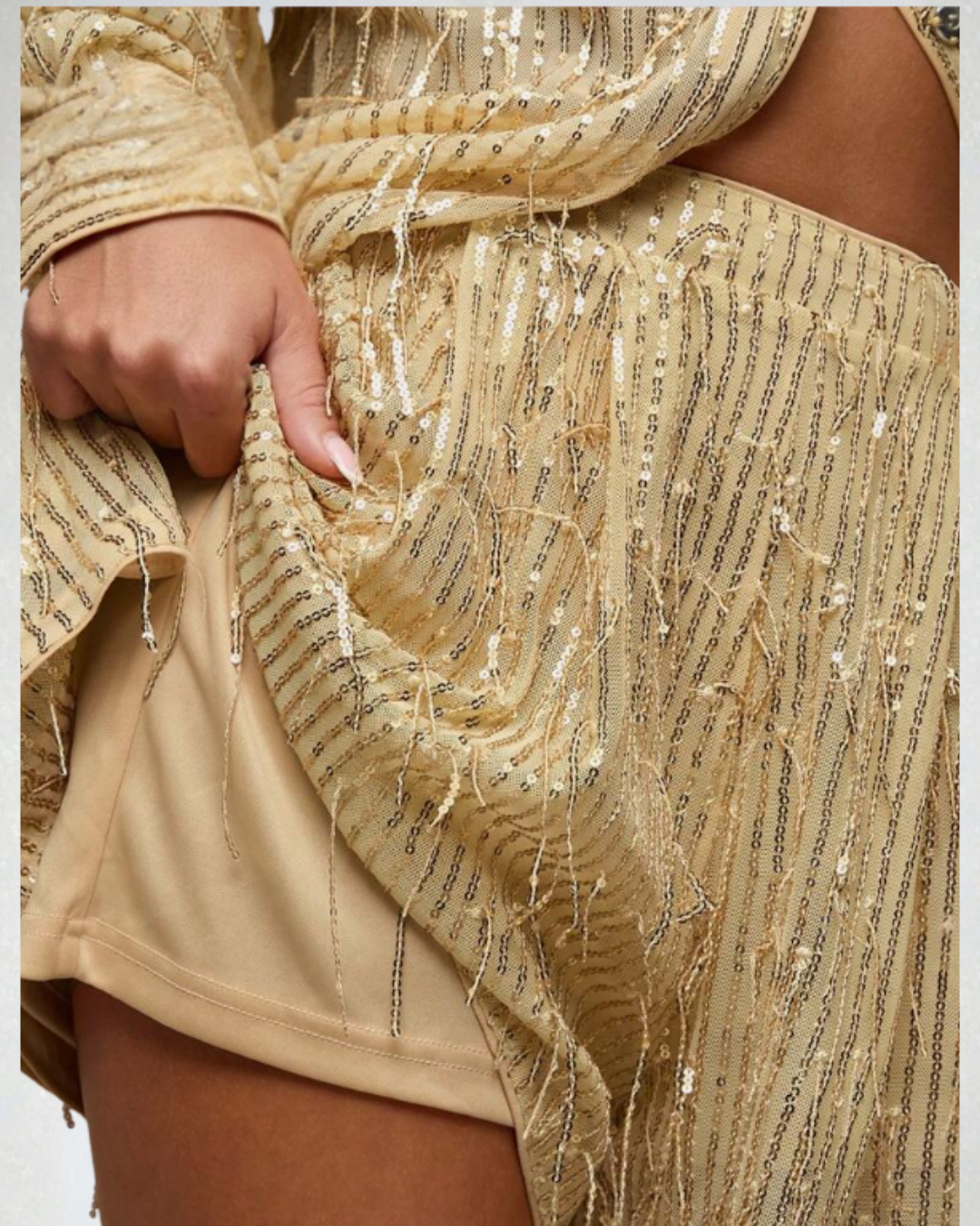 Close-up of the Shalin' Gold Sequin Shorts on model, showing fabric and lining