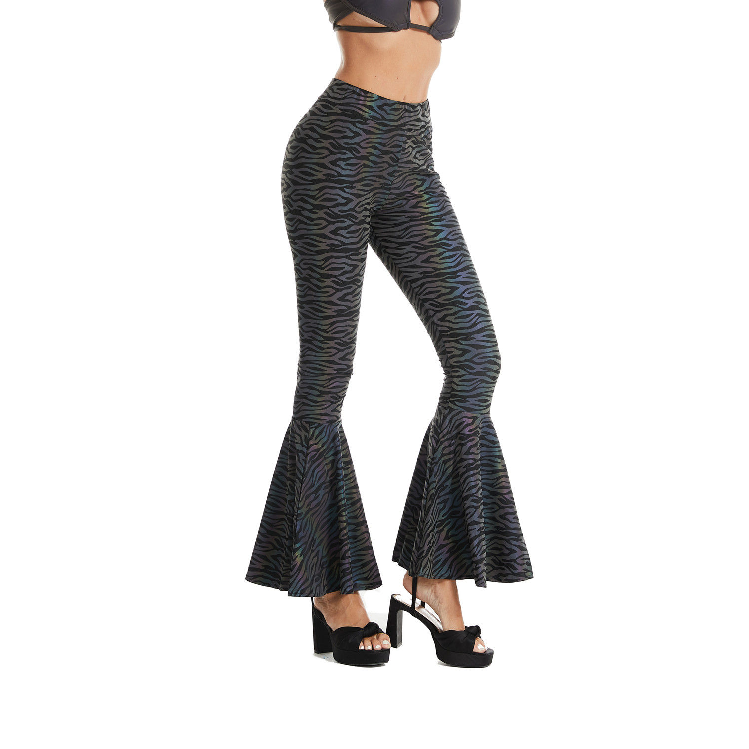 Side view of Safari Strike zebra print reflective bell bottom pants in daylight