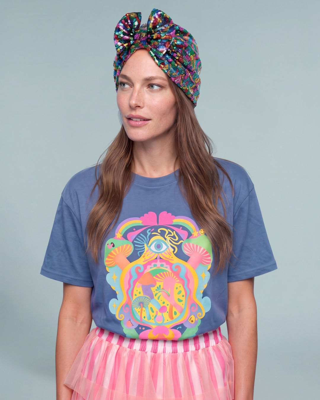 Model wearing Confetti Club rainbow sequin festival turban with raglan tee and striped tulle pants