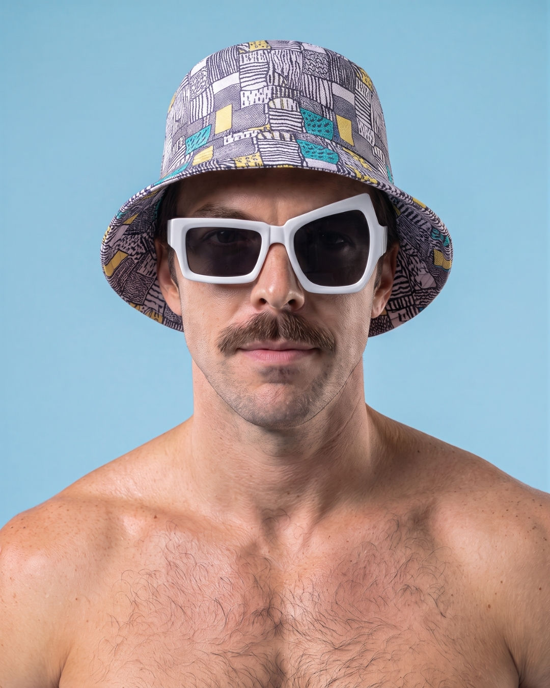 Front head and shoulders image of man wearing Wild Card bucket hat by Captain Fantastic