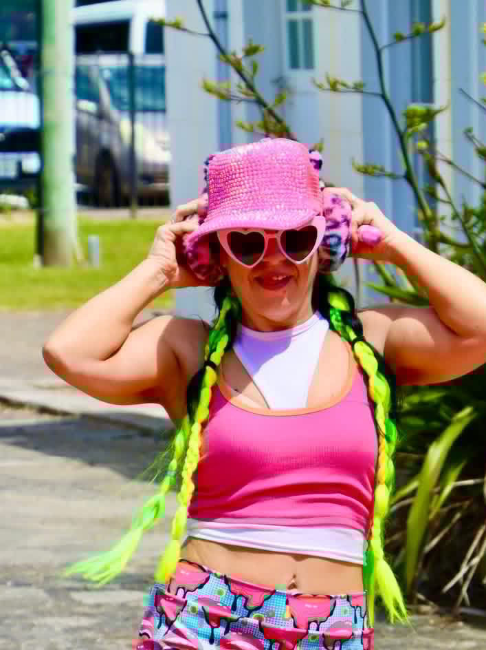 Lifestyle view of woman wearing Disco Crystal Trucker Cap at Fringe Festival
