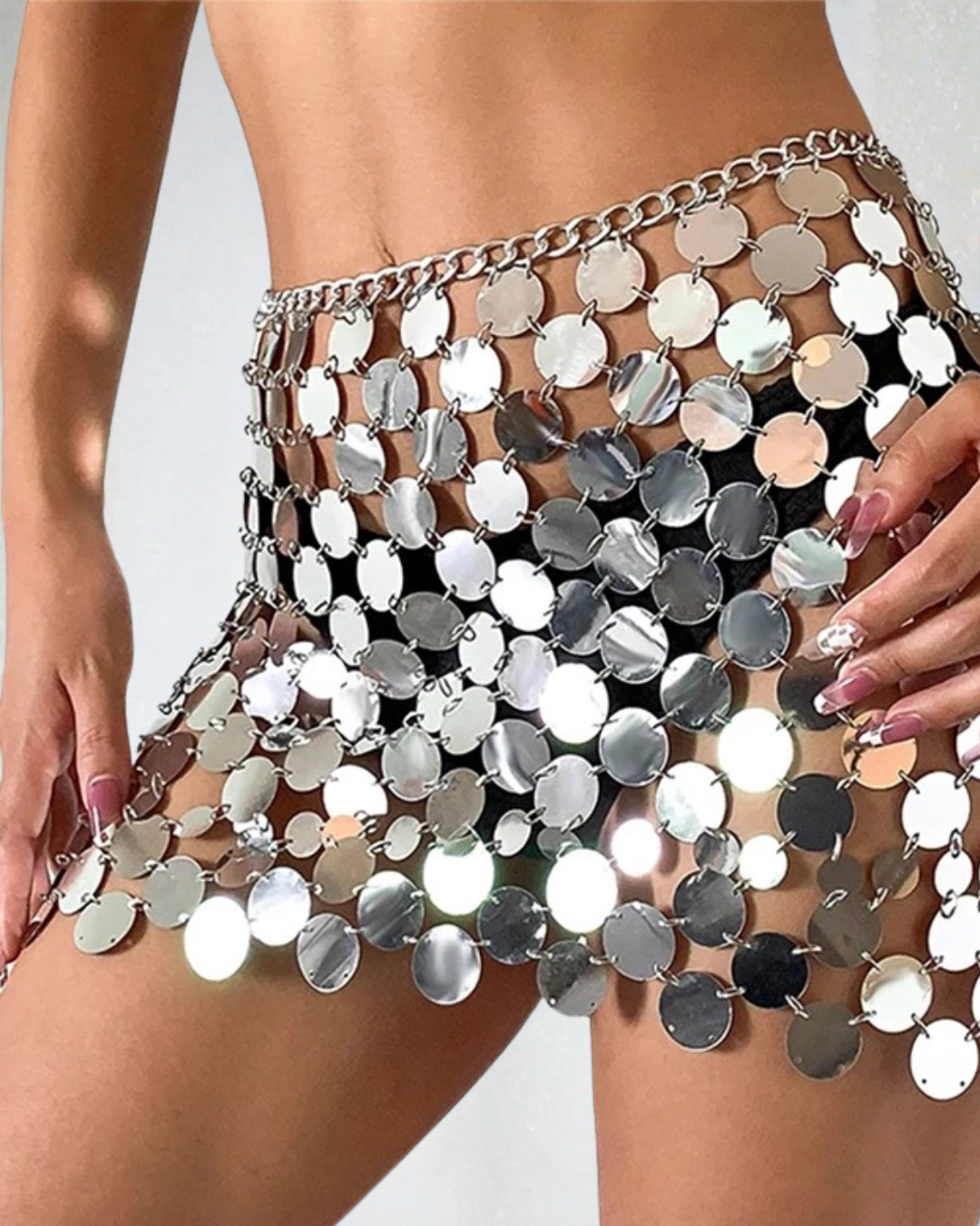 Close up of the Silver Disco Mini Skirt showing plastic disc and chain construction