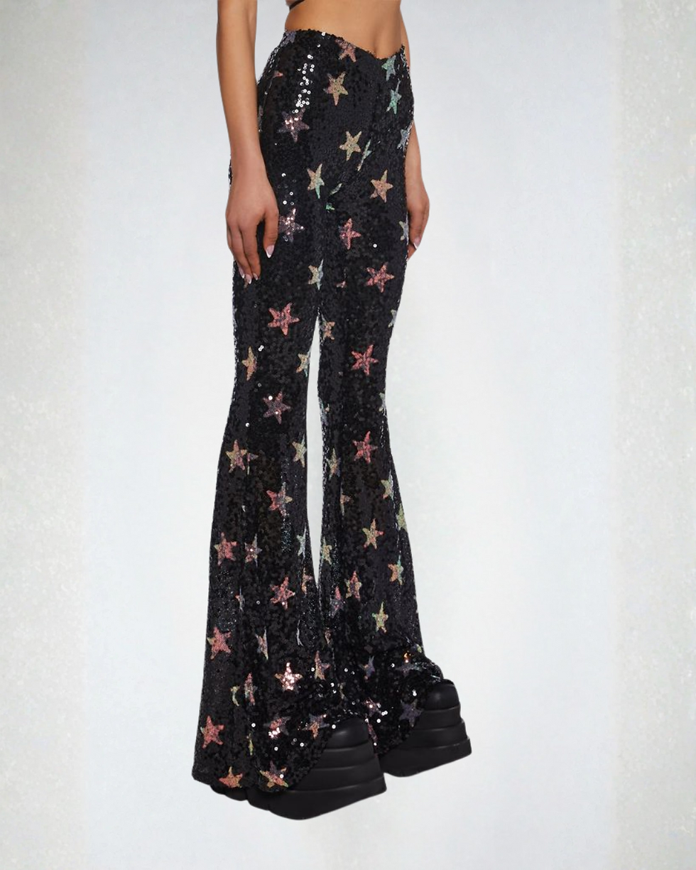 Thumbnail: Lower 3/4 angle view of Star Spangled sequin flare pants on model