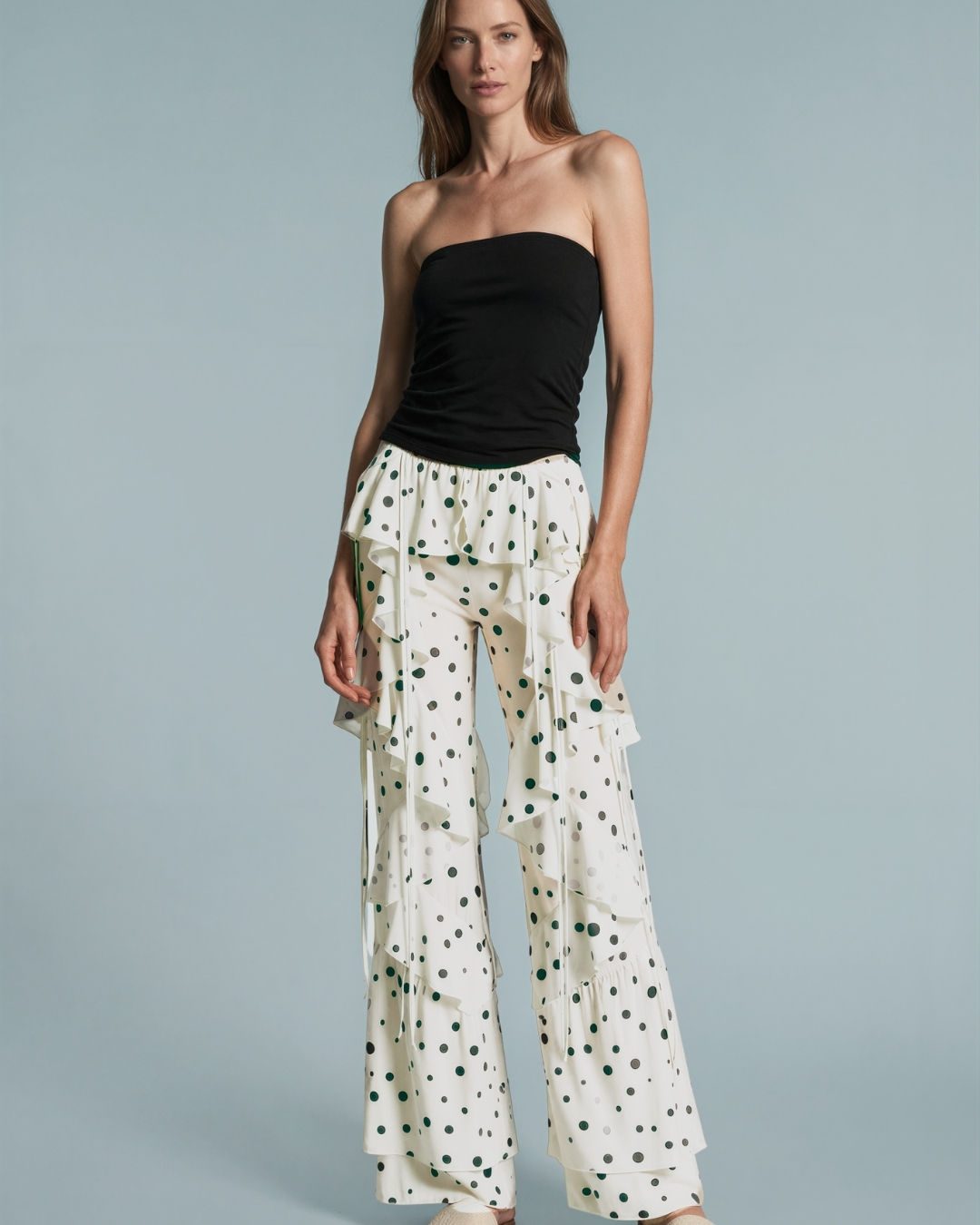 Front view of the Dotty About You Ruffle Pants on model, showing ruffle legs, design and fit