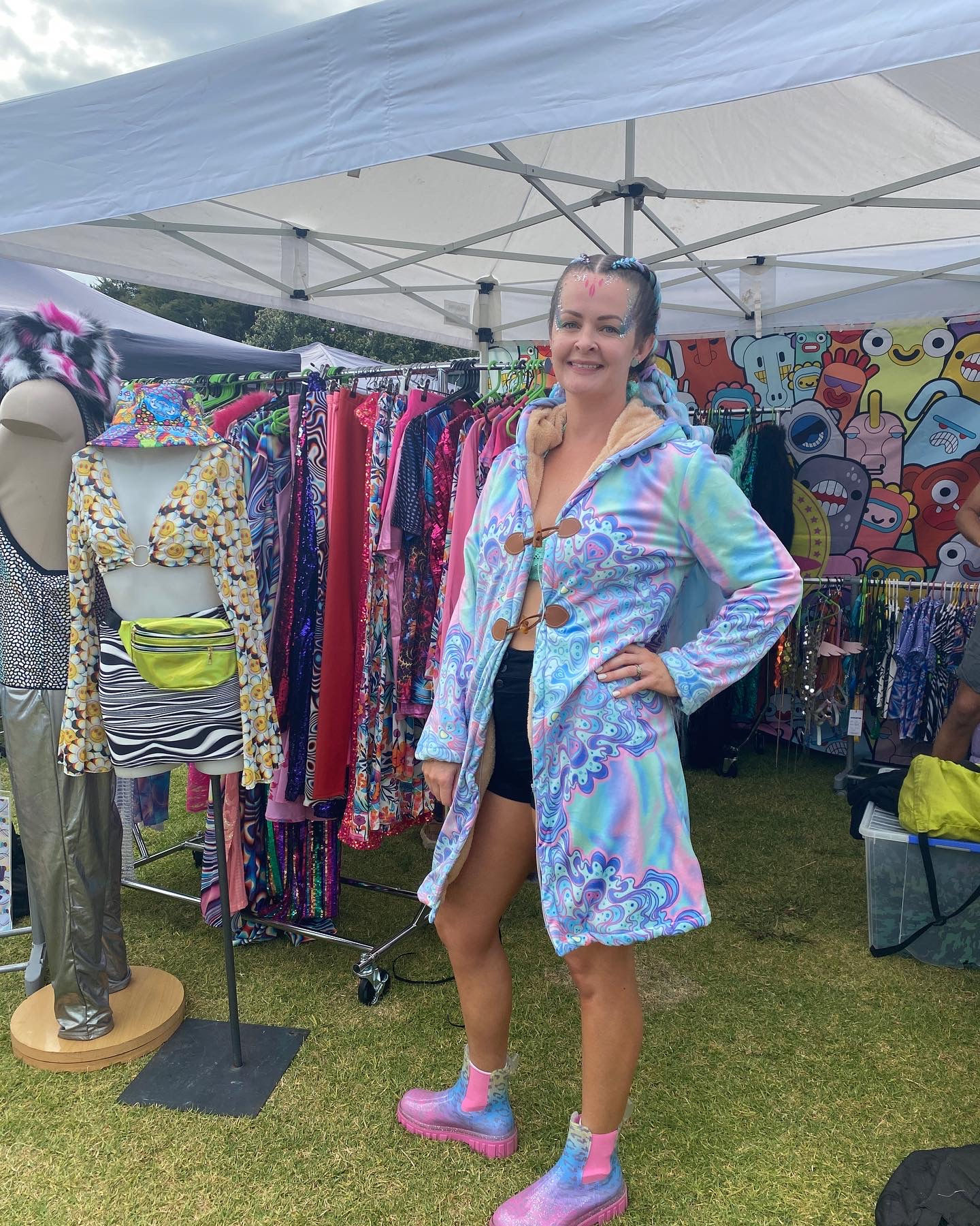 Lion Spirit rave coat, right side angle, lifestyle, woman at festival