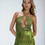 Thumbnail: Alternate front view of Model wearing It's A Wrap Chartreuse sequin mini skirt, styled with crochet sequin halter top