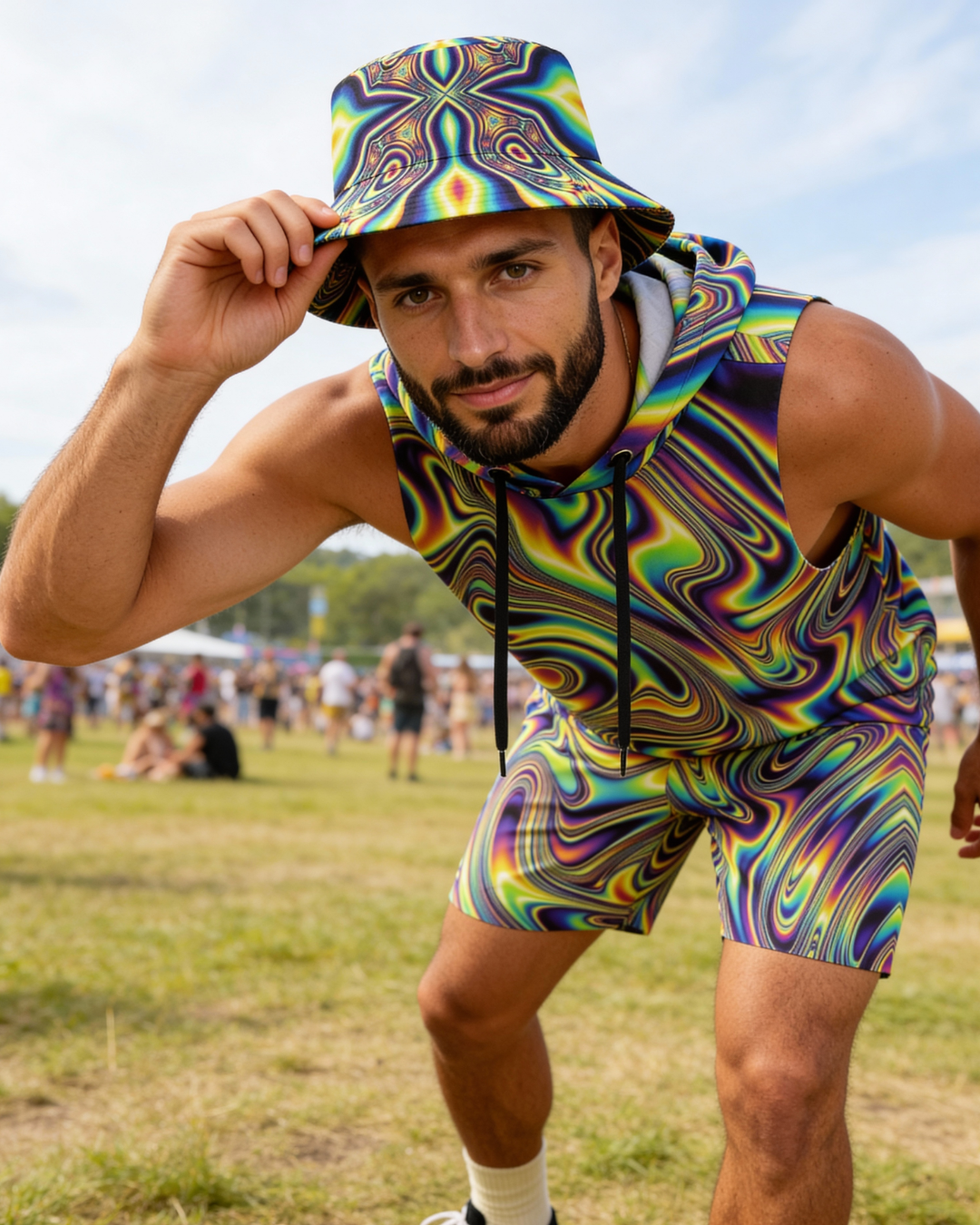 Lifestyle image of man wearing the Baddie Sleeveless Hoodie and Shorts Set at music festiva;